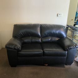Black vinyl loveseat