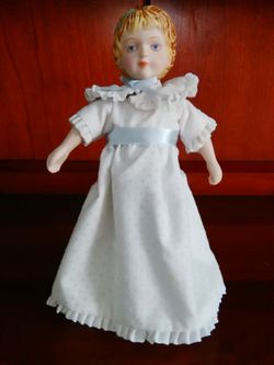 Avon Vintage Porcelain Doll With Stand.