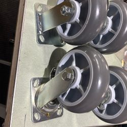 heavy-duty swivel caster wheel with a brake mechanism and a gray thermoplastic rubber 