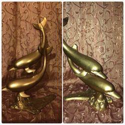 Brass Dolphins statue