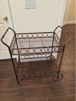 Beautiful metal basket cart  decoration bronze color organizer in excellent condition is 32”h x 32” L x 20” wide
