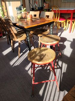 2 Rustic metal red stools with wooden top