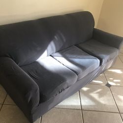 Sleeper Sofa With Cover On It 
