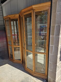 Two Oak and Glass Cabinets