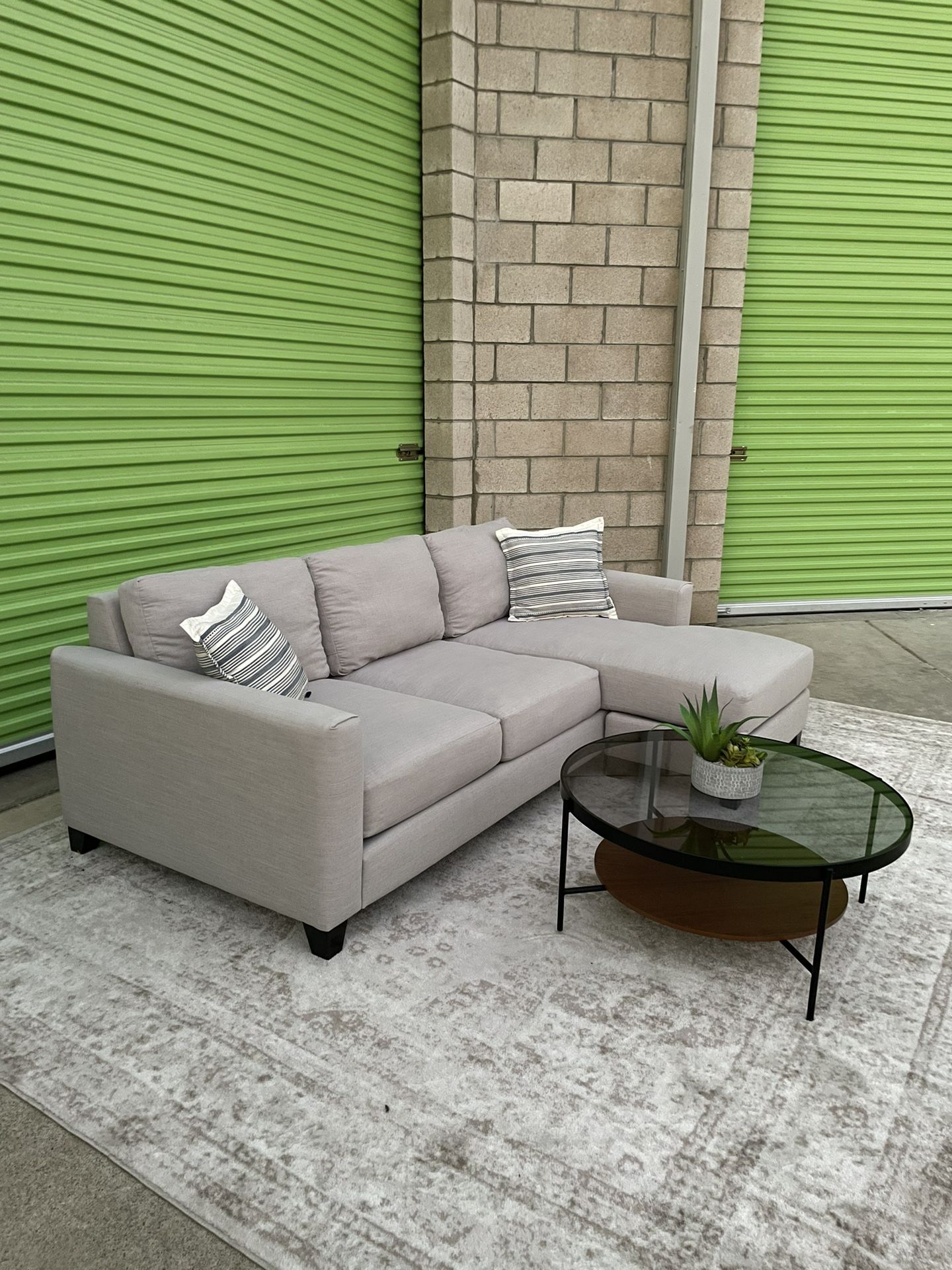 *Free Delivery* Gray Living Spaces Sectional Reversible Chaise