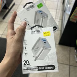 Two prong wall adapter with a USB and Usb-C Ports