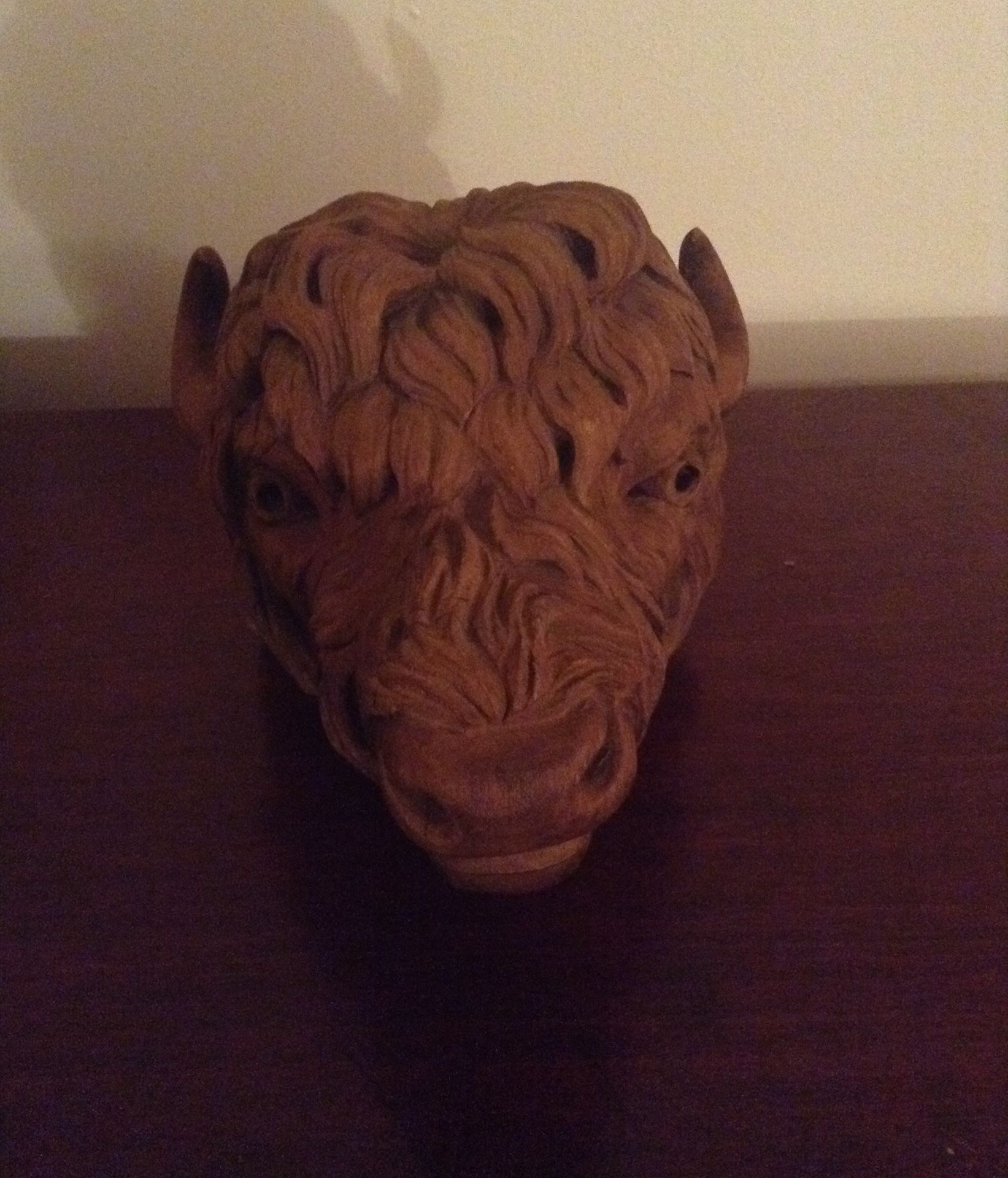 Carved wood buffalo head