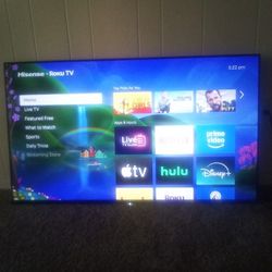 Roku TV With Remote And Legs