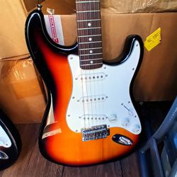 Squier By Fender Electric Guitar 