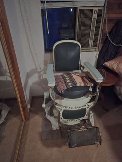 Vintage barber chair or tattoos