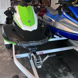 2 Yamaha Waverunners w/Trailer