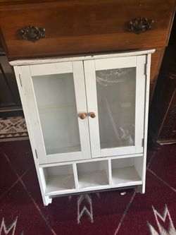 Project cabinet with towel rack.