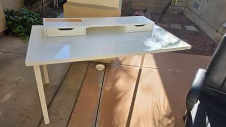 Free Ikea office desk, office chair, and computer monitor