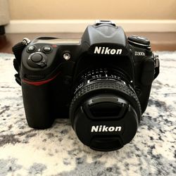 Nikon D300s Camera With 24 mm Lens AND 50mm Lens With Extra Battery And CF Card 