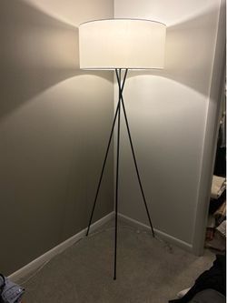 Black tripod floor lamp
