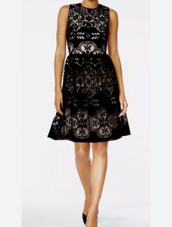 Brand new woman’s Tommy Hilfiger brand black lace mini dress up for sale 