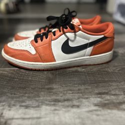Jordan 1 Low orange trainers 