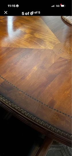 Round Wood Dining Table with Carved Edge
