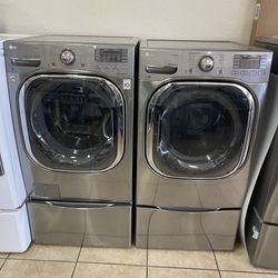 Front Load LG 4.3 cubic feet And an electric dryer 7.5 ft.³