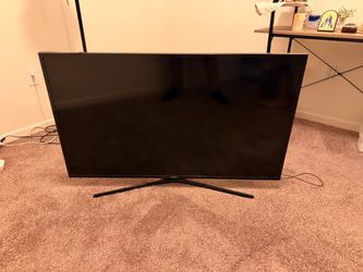 Samsung 50” Smart TV + Fire TV Stick & Remote