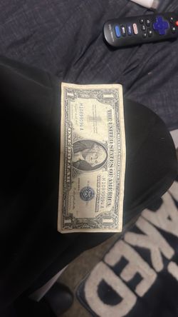 1957 blue certificate one dollar bill in great condition