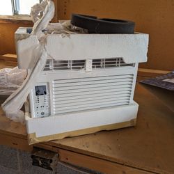 Opened but NEW room Air Conditioner 