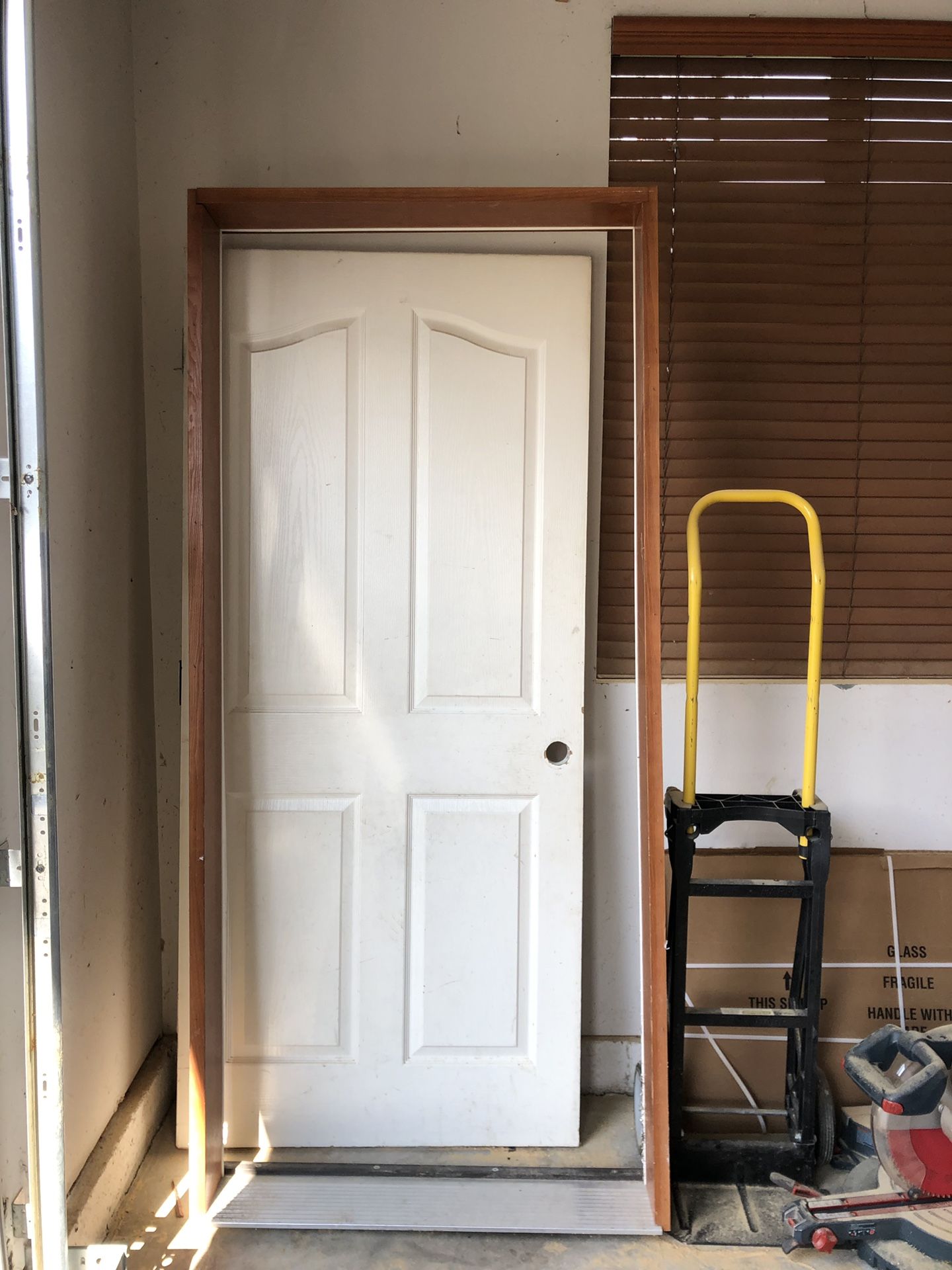 Garage entry door with frame