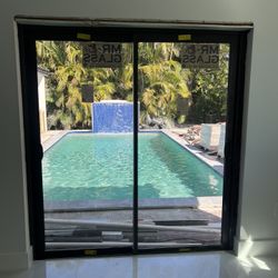 72x80  Impact Sliding Glass Door/aluminim Bronze NOA