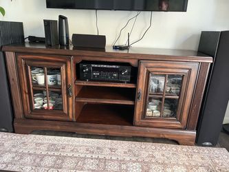 Beautiful, solid wood entertainment center/media console with plenty of storage and a classic, timeless design.