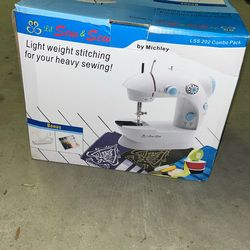 Small Sewing Machine Still in its Box