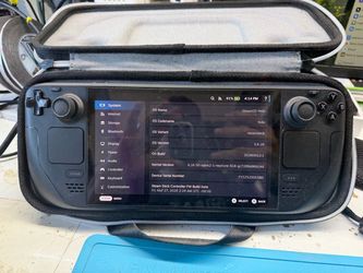 steam deck oled 1tb.   + mouse click buttons