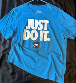 Blue Nike shirt size M