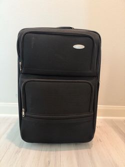 Samsonite Black Soft-Side Rolling expendable 27” check in luggage