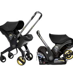 DOONA Car Seat & Stroller & Latch Base - Nitro Black - REAR FACING - ALL IN ONE TRAVEL SYSTEM 