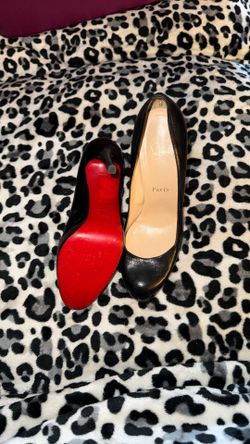 Christian Louboutin black pumps