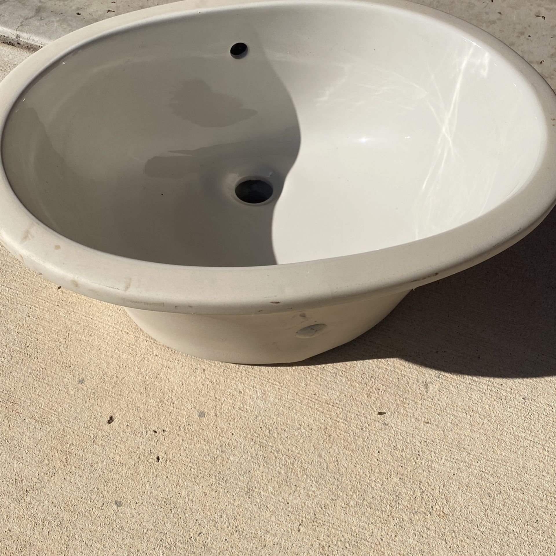 Solid Ceramic sink bowl with high quality Brass fittings and attachments.