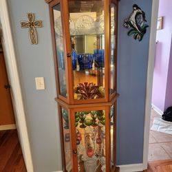 Curio Display Cabinet w/ Light. Trapezoid Shape? 29x11x76H. Contents NOT Included. See Photos.
