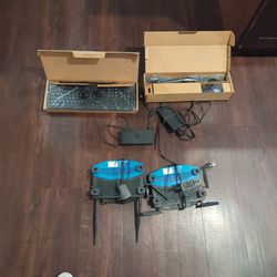 Linksys Router / Dell Keyboard And Mouse / Dell Dock