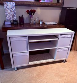 Ikea Kallax table with keyboard slides and storage.