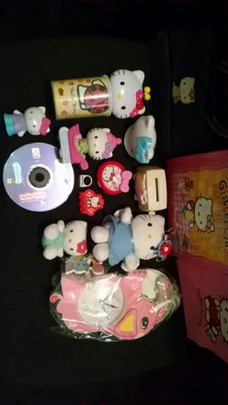 Hello Kitty purse, clock, lunch bag, CD, toys, books, ring & more