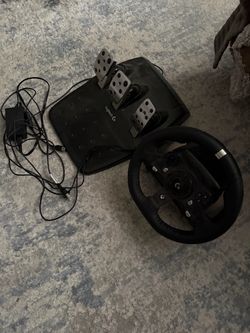 Logitech steering wheel and floor pedals. Xbox and pc