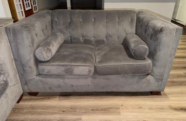 Two gray couches