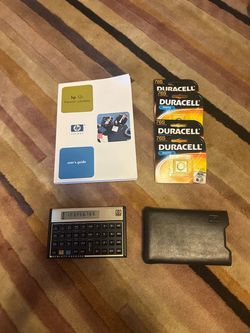 HP 12C Financial Calculator with Case and Manual