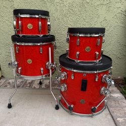 Orange custom cocktail drum set made by Stauffer Percussion
