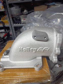 Holley efi elbow for Ford throttle body.