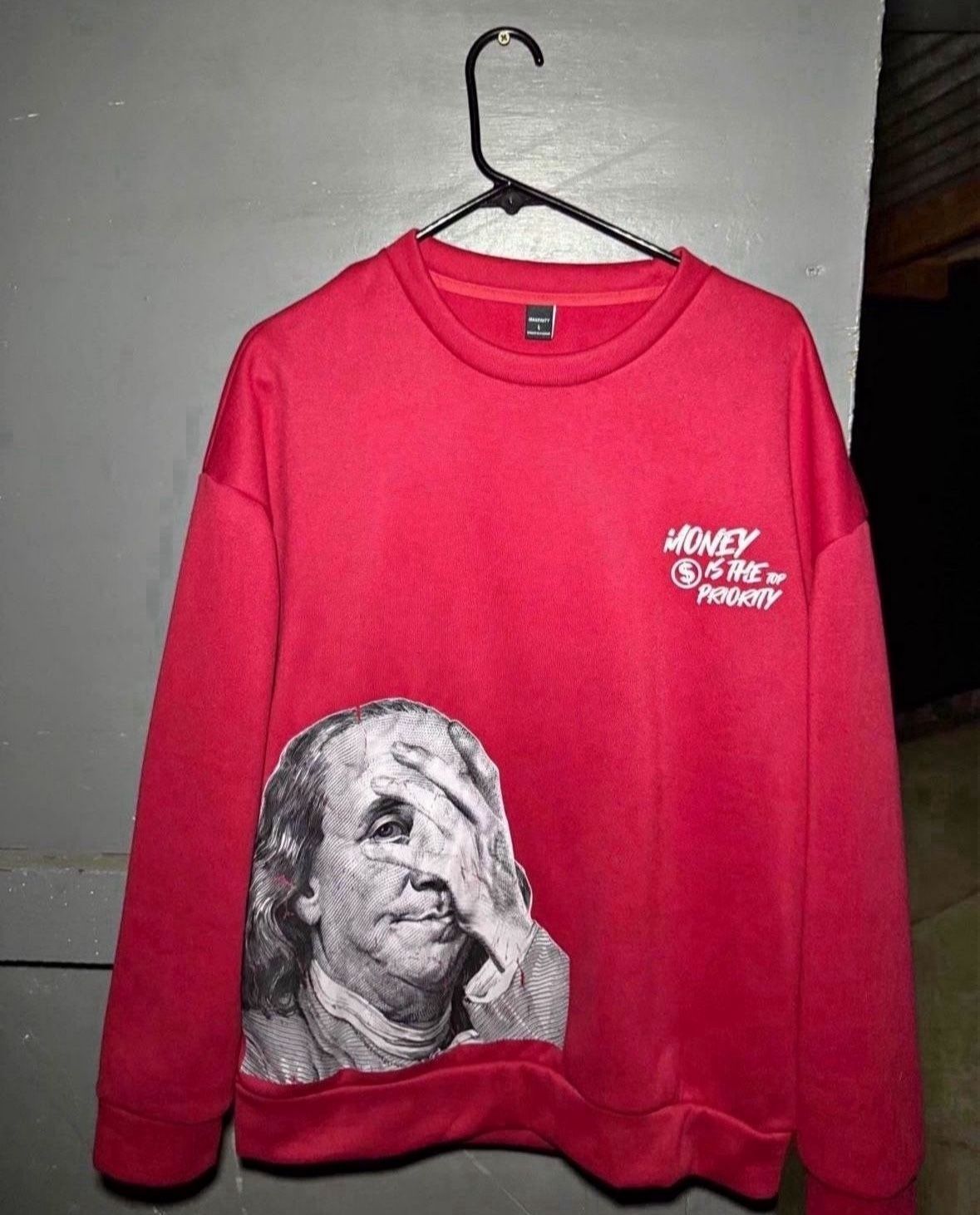 Money is the top priority crewneck