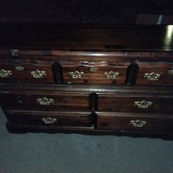 Drawer Dresser And A Mirror