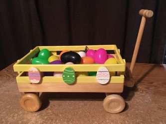 Decorative wood toy wagon Easter decor with plastic eggs