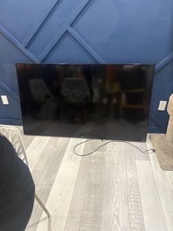 65” Onn  Roku smart Tv mounted