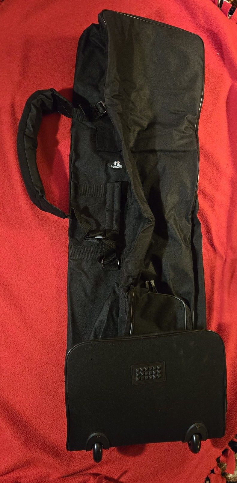 RJ Sports Brand 48" Rolling Travel Golf Bag. RJ Sports Brand 48" Rolling Travel Golf Bag. Padded shoulder strap with large front zipper compartment.